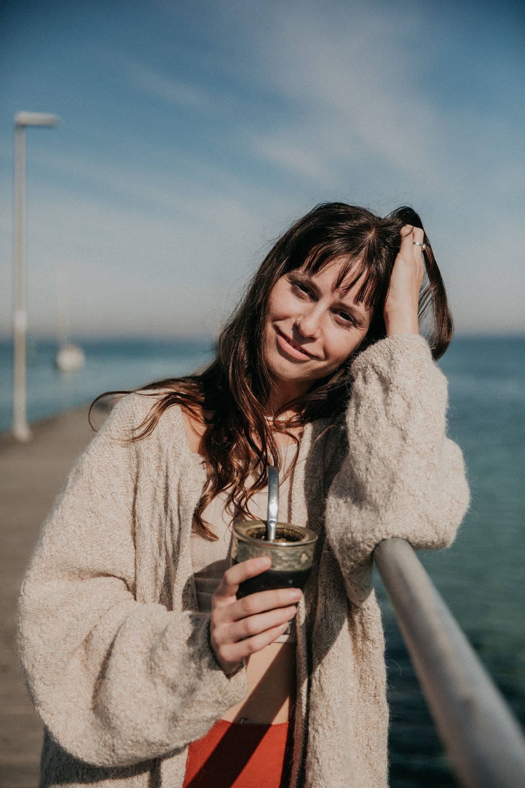 Sulli at pier with yerba mate